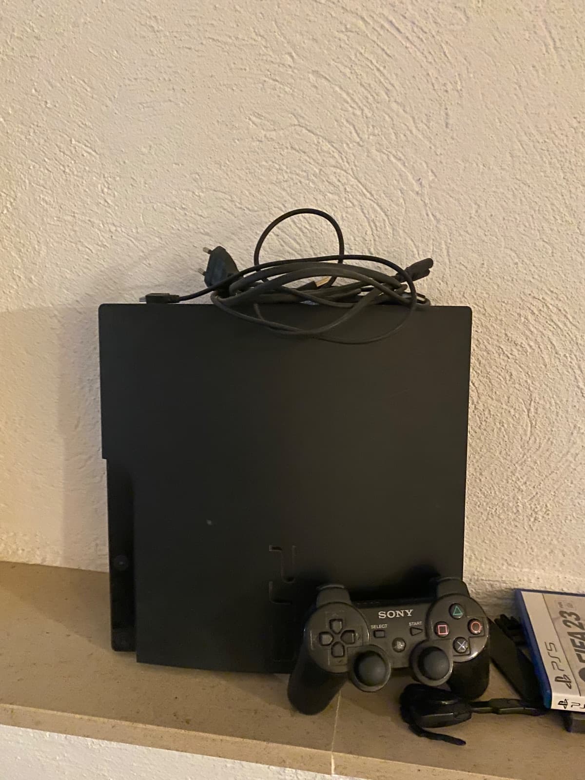 PlayStation 3 con mando Sony inalámbrico